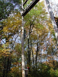 Alex Dainis climbing rope ladder