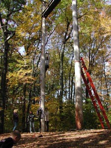 George Dainis climbing rope ladder